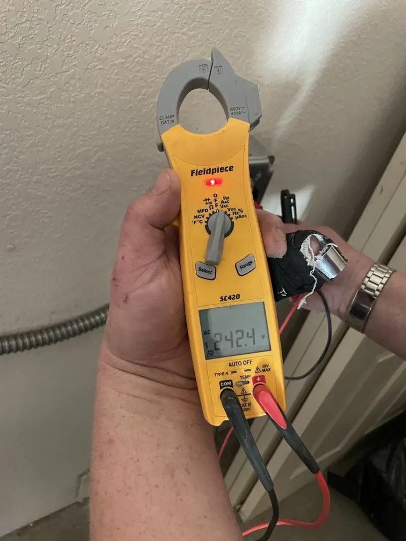Voltage testing with clamp meter during Outlet Installation in Joppatowne